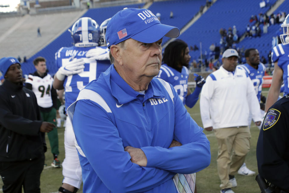 Duke head coach David Cutcliffe walks off the field after the team lost an NCAA college football game against Miami, Saturday, Nov. 27, 2021, in Durham, N.C. (AP Photo/Chris Seward)