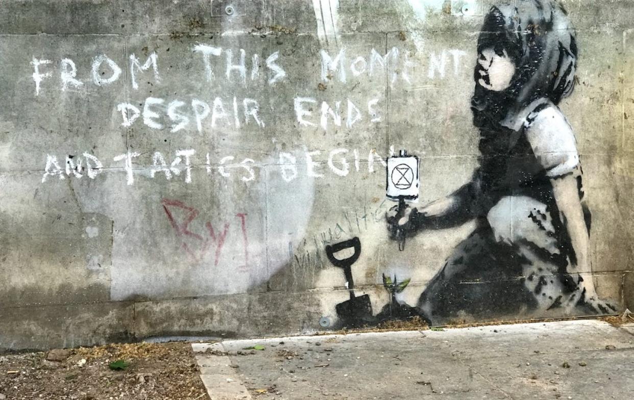 <span class="caption">Mural attributed to Banksy that appeared by Marble Arch, in London, during the Extinction Rebellion protests in April 2019.</span> <span class="attribution"><a class="link " href="https://commons.wikimedia.org/wiki/File:From_this_moment_despair_ends.jpg" rel="nofollow noopener" target="_blank" data-ylk="slk:(Andrew Davidson/Wikimedia);elm:context_link;itc:0;sec:content-canvas">(Andrew Davidson/Wikimedia)</a>, <a class="link " href="http://creativecommons.org/licenses/by-sa/4.0/" rel="nofollow noopener" target="_blank" data-ylk="slk:CC BY-SA;elm:context_link;itc:0;sec:content-canvas">CC BY-SA</a></span>