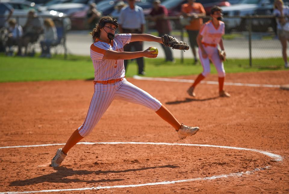 Lincoln Park Academy pitcher Makayla Megnauth (center) fires a fast pitch to John Carroll in the 3rd inning at John Carroll High School on Tuesday, March 12, 2024, in Fort Pierce. John Carrol won 11-0.