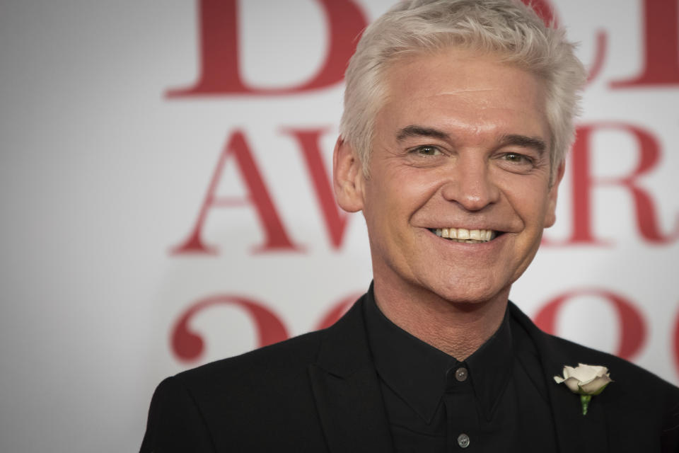Phillip Schofield poses for photographers upon arrival at the Brit Awards 2018 in London, Wednesday, Feb. 21, 2018. (Photo by Vianney Le Caer/Invision/AP)