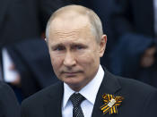 FILE - Russian President Vladimir Putin arrives to attend the Victory Day military parade to celebrate 74 years since the victory in WWII in Red Square in Moscow, Russia, May 9, 2019. Some in the West think Russian President Vladimir Putin may use the Victory Day on May 9 when Russia celebrates the defeat of Nazi Germany in World War II to officially declare that war is underway in Ukraine and announce a mobilization _ the claim rejected by the Kremlin. (AP Photo/Alexander Zemlianichenko, File)