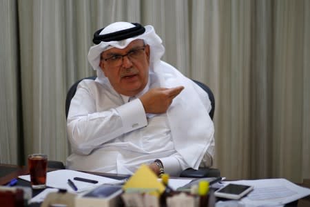 Qatari envoy Mohammed Al-Emadi gestures during an interview with Reuters in Gaza City