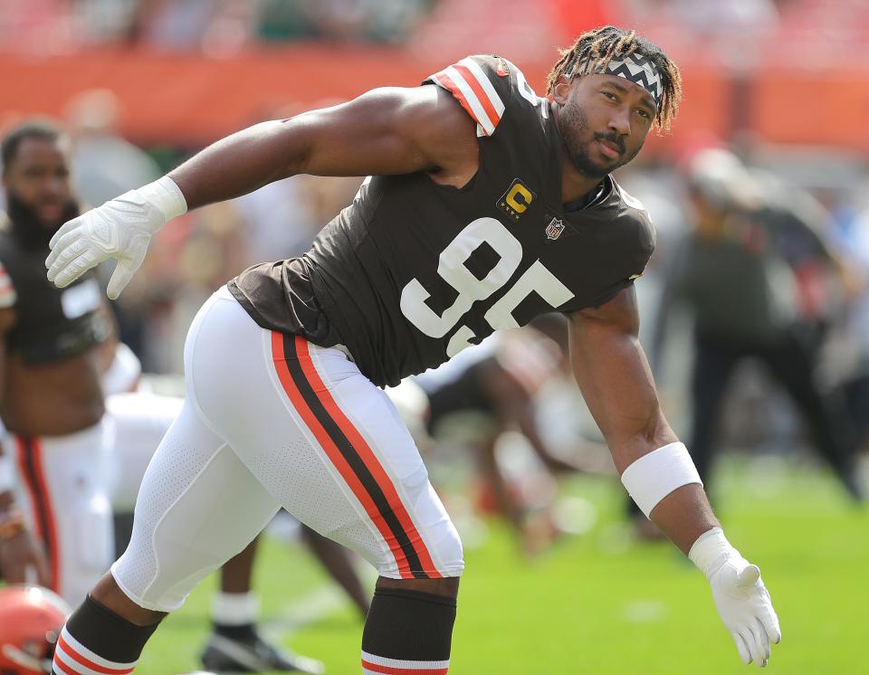 Browns defensive end Myles Garrett stretches before the game against the New York Jets on Sunday, Sept. 18, 2022 in Cleveland.