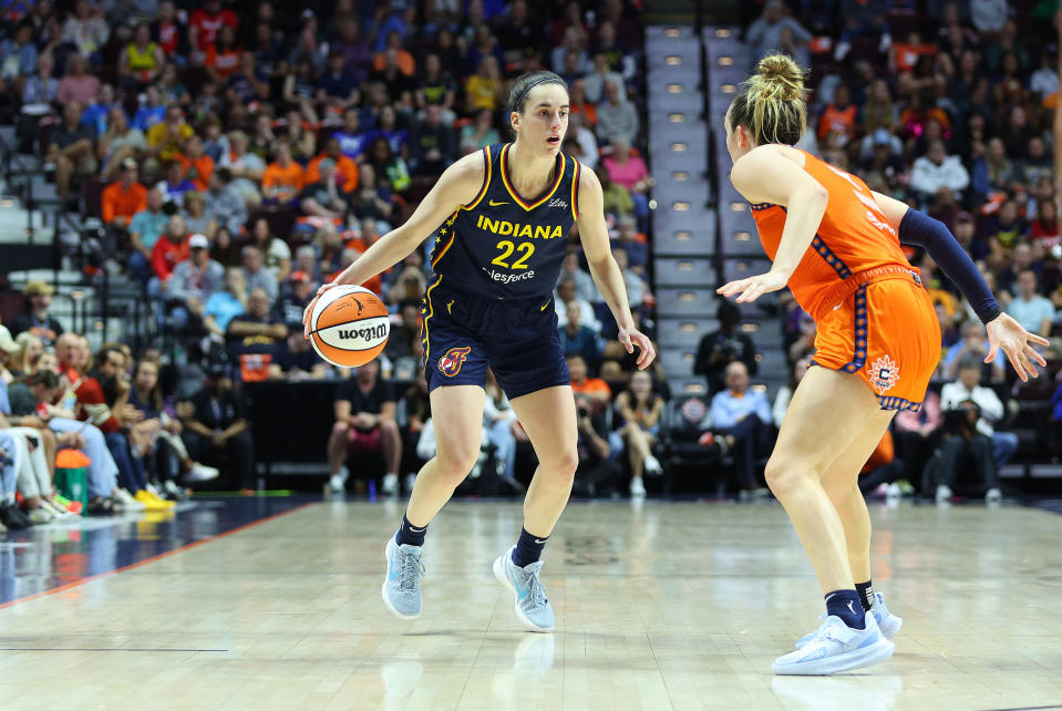 UNCASVILLE, CT - SEPTEMBER 22: Indiana Fever guard Caitlin Clark (22) is defended by Connecticut Sun guard Marina Mabrey (4) during Game 1 and 1 of the 2024 WNBA Playoffs between the Indiana Fever and Connecticut Sun on September 22, 2024 at Mohegan Sun Arena in Uncasville, CT. (Photo by M. Anthony Nesmith/Icon Sportswire via Getty Images)