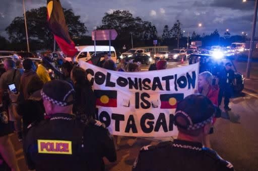 About 100 Aboriginal activists faced off against police outside the stadium. Source: AFP