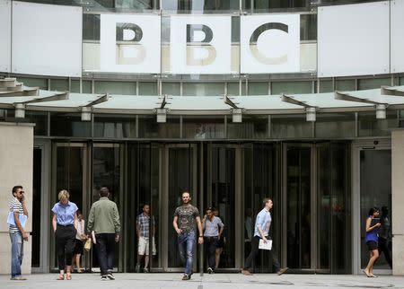 People arrive and depart from Broadcasting House, the headquarters of the BBC, in London Britain July 2, 2015. REUTERS/Paul Hackett