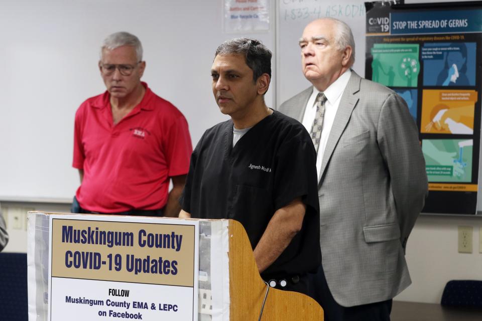 Dr. Jignesh Modi, infection disease specialist with Genesis Hospital, talks about the first confirmed case of COVID-19 in Muskingum County during a press conference at the Muskingum County Emergency Management office in this file photo.