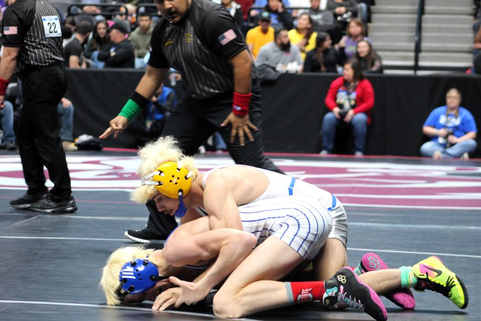 Dolores Huerta's AJ Jaramillo gains top control over Jackson McCabe of Nucla during their Class 2A 113-pound matchup of the CHSAA state wrestling tournament on Thursday, Feb. 15, 2024.