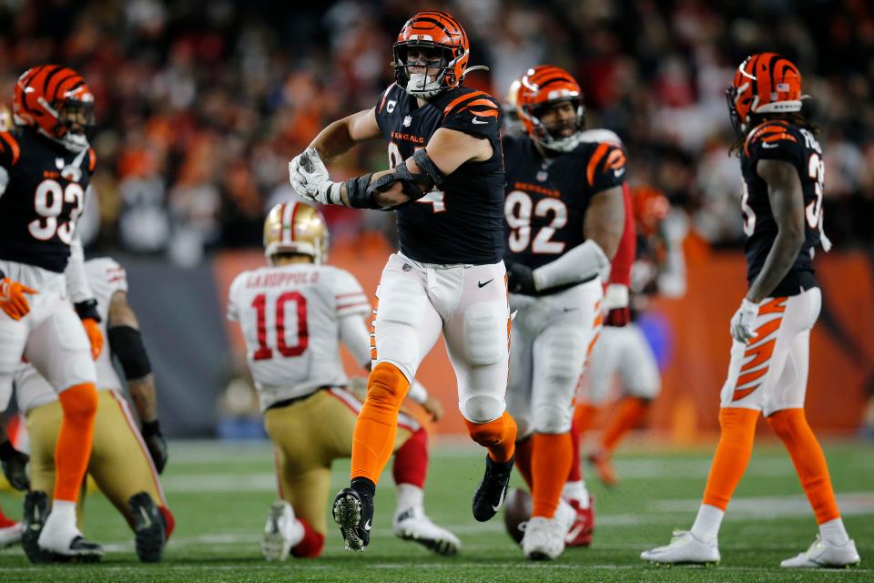 Cincinnati Bengals defensive end Sam Hubbard (94) celebrates after a stop in the fourth quarter of the NFL Week 14 game between the Cincinnati Bengals and the San Francisco 49ers at Paul Brown Stadium in downtown Cincinnati on Sunday, Dec. 12, 2021. The Bengals tied the game in the fourth quarter, but eventually fell to the 49ers in overtime, 26-23. 