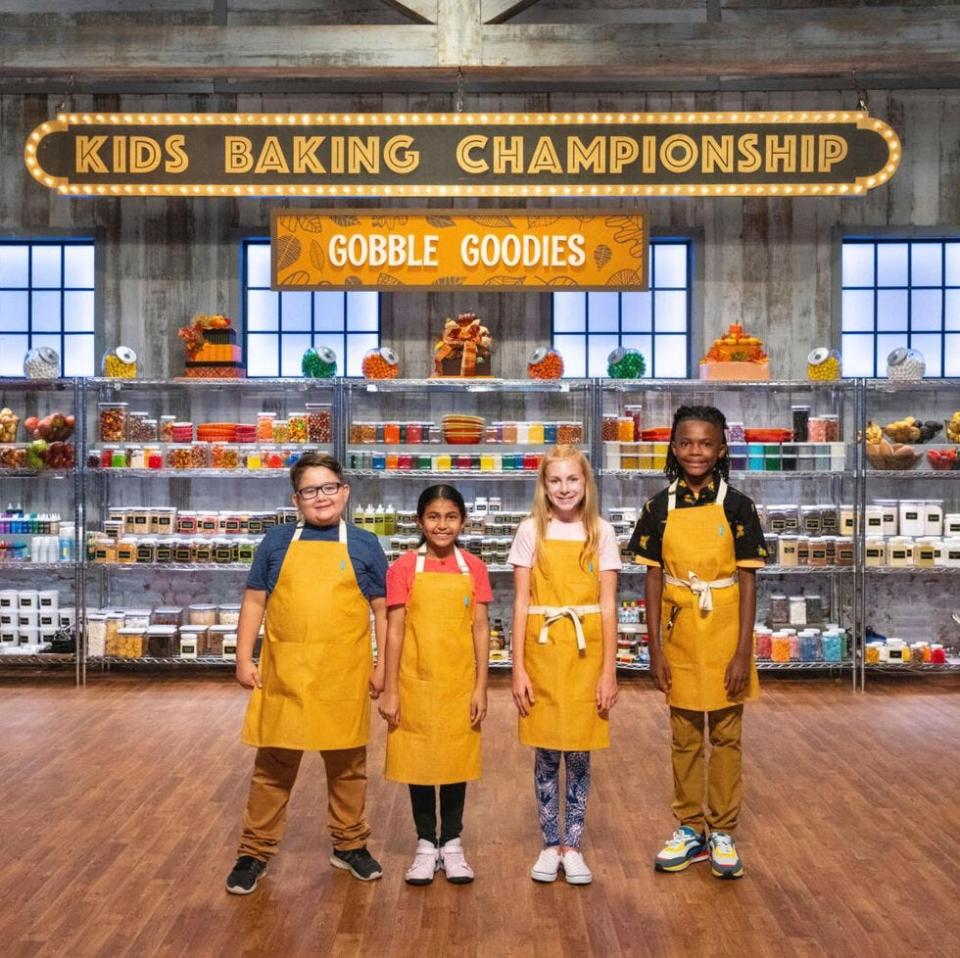 Caroline Gross, center right, during the Food Network's Kids Baking Championship Thanksgiving special, "Gobble Goodies."