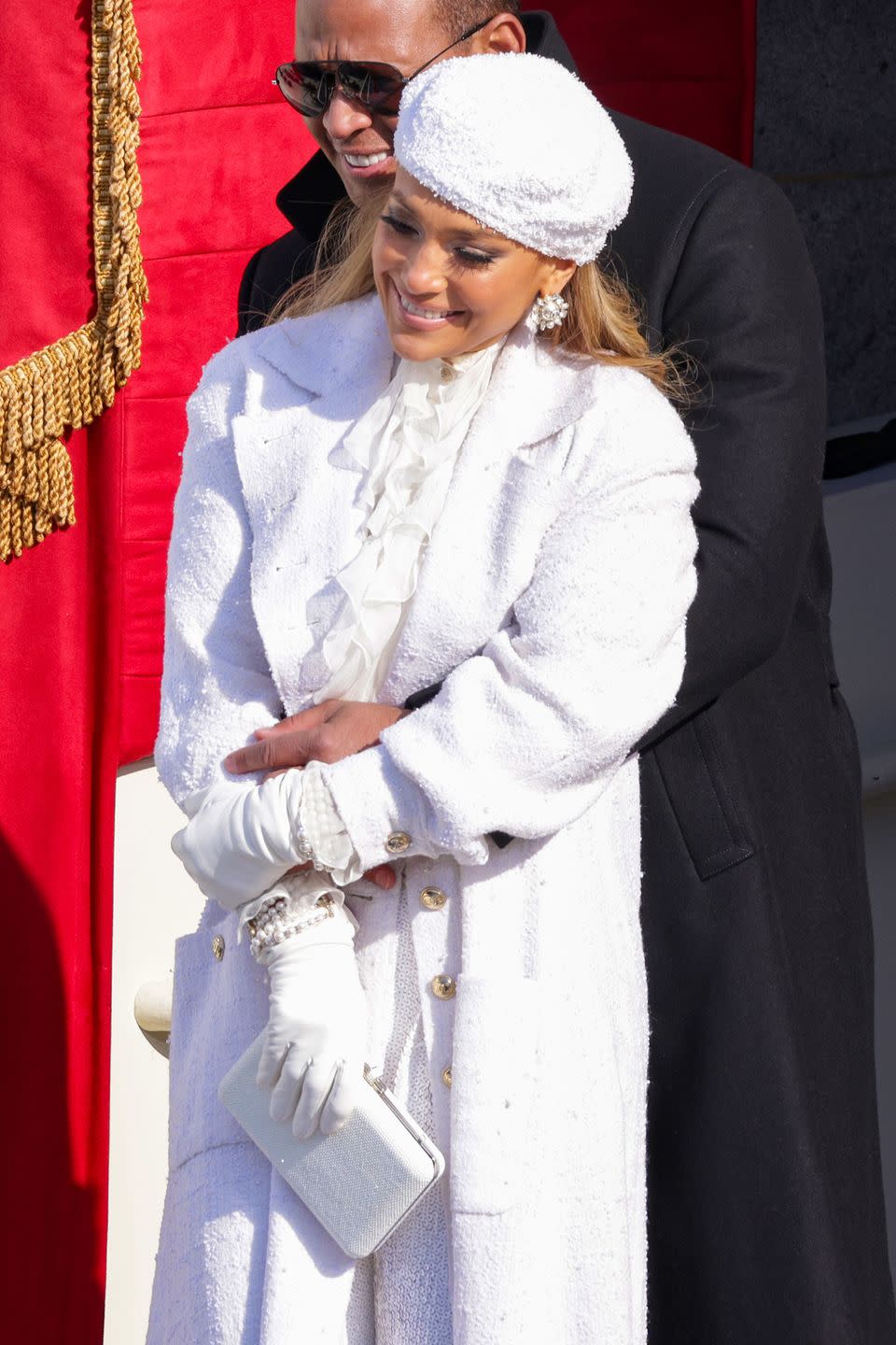 <p>She finished her look with a matching beret and glistening statement earrings.</p>