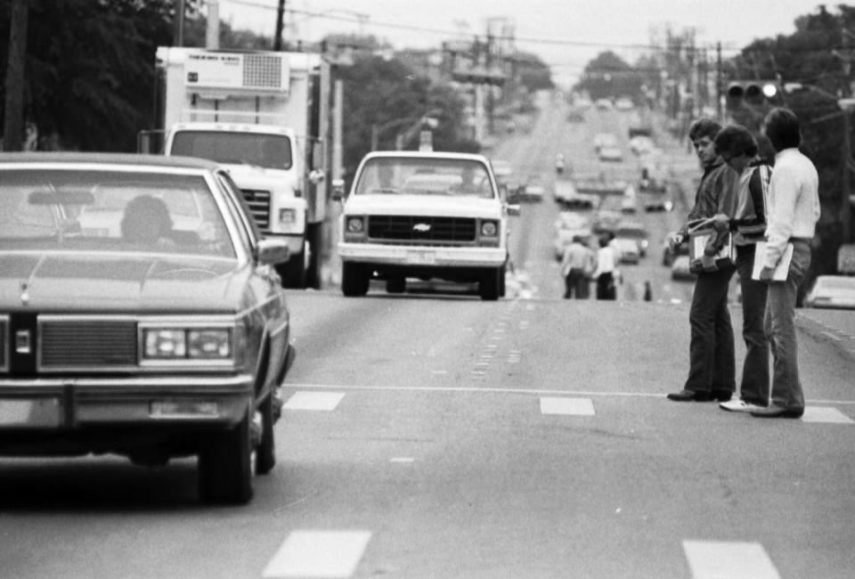 1984: A photograph of University of Texas at Arlington students trying to cross Cooper Street on campus.
