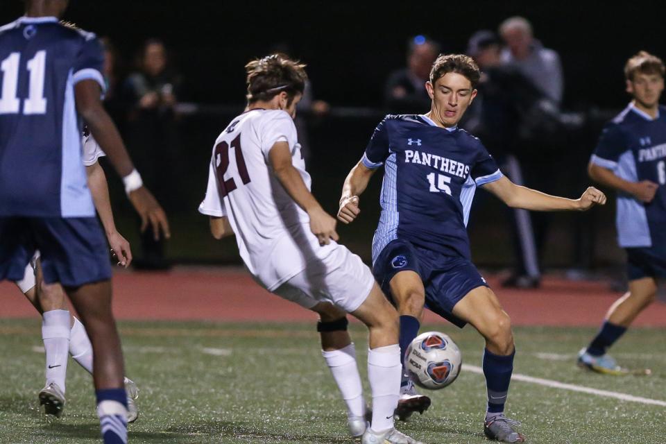Franklin’s Garrett Scagliarini steals the ball during the Division 1 Round of 32 soccer game against Belmont at Franklin High School on Nov. 07, 2022.