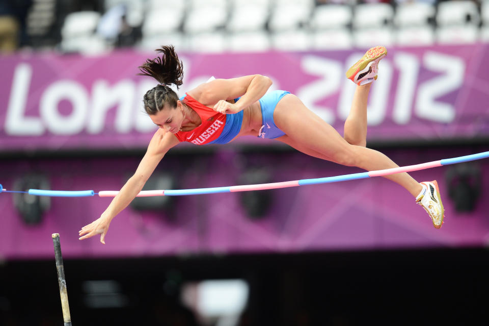 Russia's Yelena Isinbayeva practices ahead of the women's pole vault final at the athletics event of the London 2012 Olympic Games on August 6, 2012 in London.   AFP PHOTO / FRANCK FIFE        (Photo credit should read FRANCK FIFE/AFP/GettyImages)