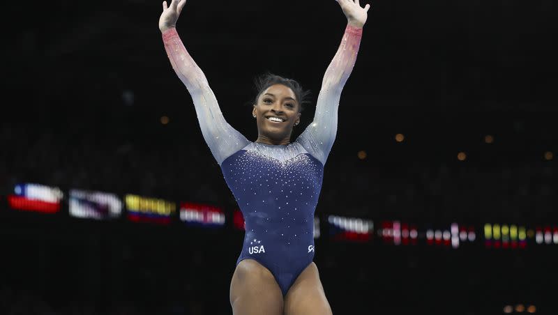 United States’ Simone Biles celebrates winning the gold medal with Team USA during the women’s team final at the Artistic Gymnastics World Championships in Antwerp, Belgium, Wednesday, Oct. 4, 2023. 