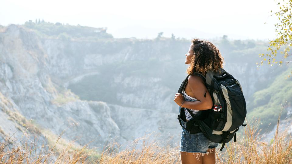 traveler looking at mountain