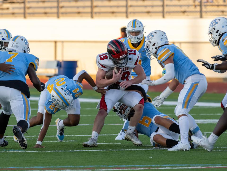 Red Lion Christian's Jacque Wilson (19) is tackled by Cape Henlopen's Brenn Scott (6) on Aug. 31. The Lions are facing a tough home game against Lake Forest on Friday night, and all three of our experts are picking the Spartans to win.