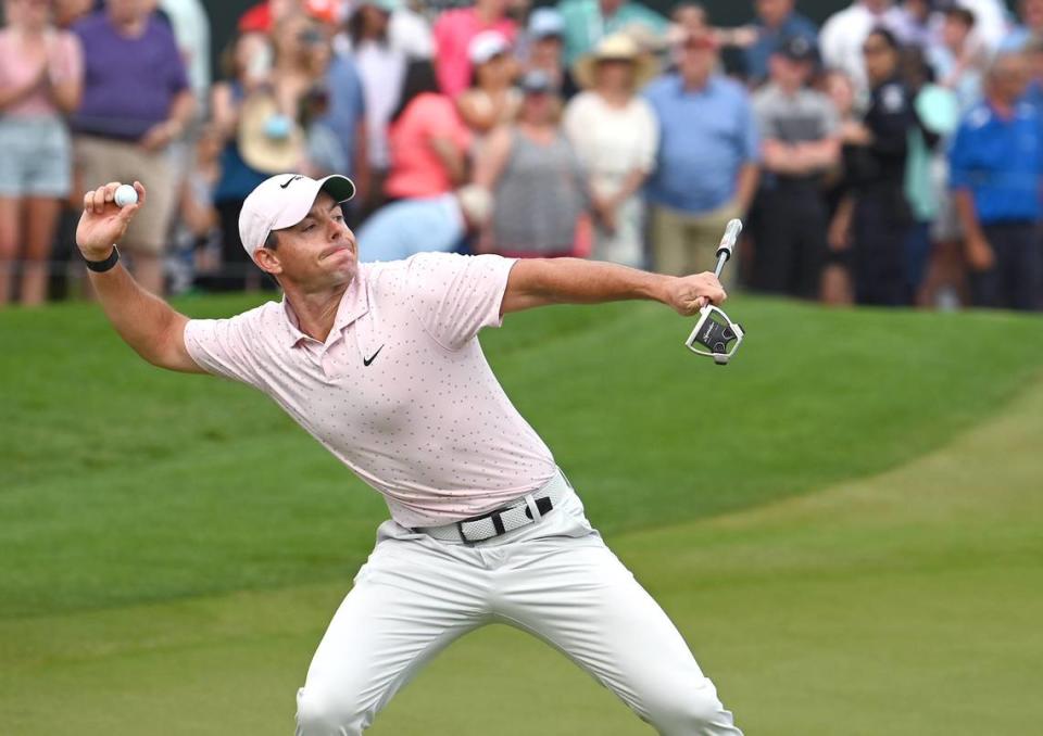 Golfer Rory McIlroy turns and throws his ball toward the crowd after winning the Wells Fargo Championship at Quail Hollow Club in Charlotte on Sunday. It was McIlroy’s third win at the tournament, which he also took in 2010 and 2015.