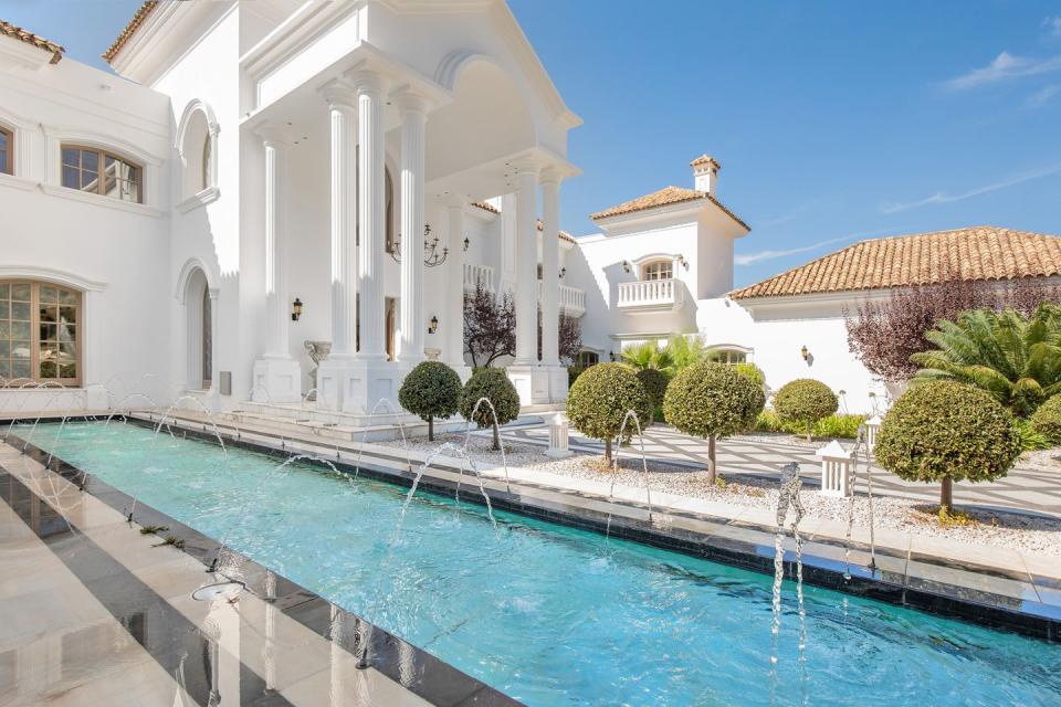 <p>With both sea and mountain views, this white-washed Spanish villa ticks all the right boxes. It has seven bedrooms, seven bathrooms, incredible architecture and plenty of storage space, too. </p><p><a href="https://www.maspropertymarbella.com/" rel="nofollow noopener" target="_blank" data-ylk="slk:This property is currently on the market via MAS Property for £12.4 million;elm:context_link;itc:0;sec:content-canvas" class="link ">This property is currently on the market via MAS Property for £12.4 million</a>. </p>