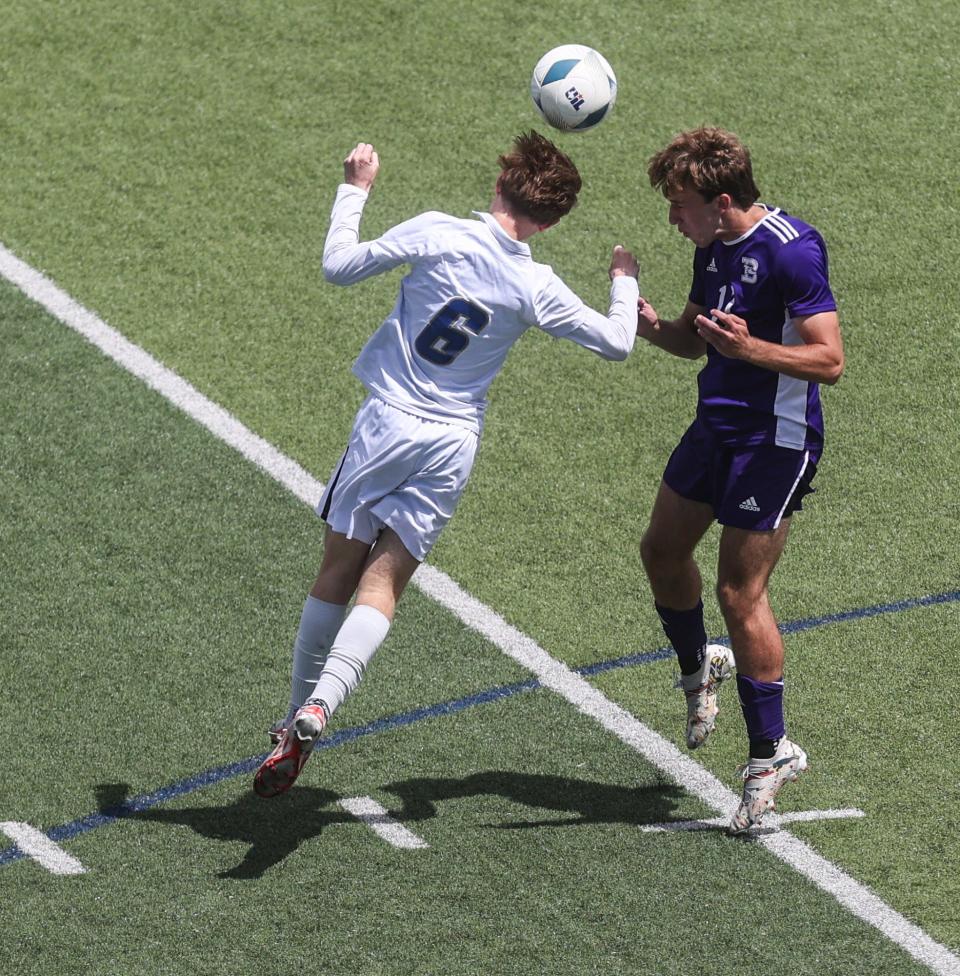 San Elizario's Noah Mendez (6) heads the ball over Boerne's Justin Bain (10) during the first half of the Class 4A boys soccer state final at Birkelbach Field on Friday, April 12, 2024, in Georgetown, Texas.