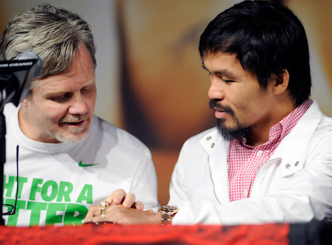    Trainer, Freddie Roach (L) Admires Getty Images