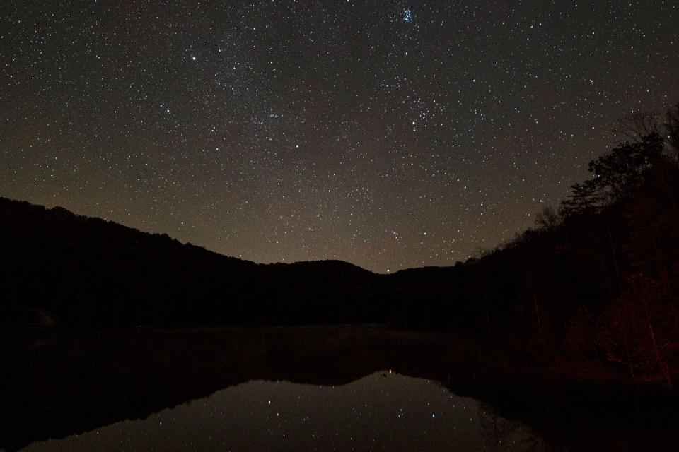 A starry night over a lake in Watoga State Park, West Virginia