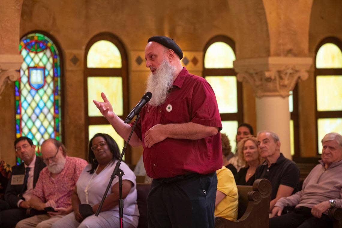 Broward College Assistant Professor Mirsad Kriještorac speaks to the panel during an interfaith discussion at Congregational United Church of Christ in Coral Gables, Florida, on Sunday, July 17, 2022.