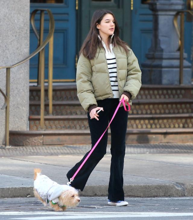 Suri Cruise Is ComfyCasual in Flared Jeans and Converse Sneakers While