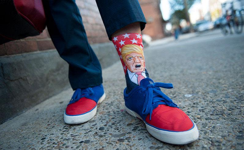 A voter displays his support for US Republican presidential nominee Donald Trump. Photo: AAP