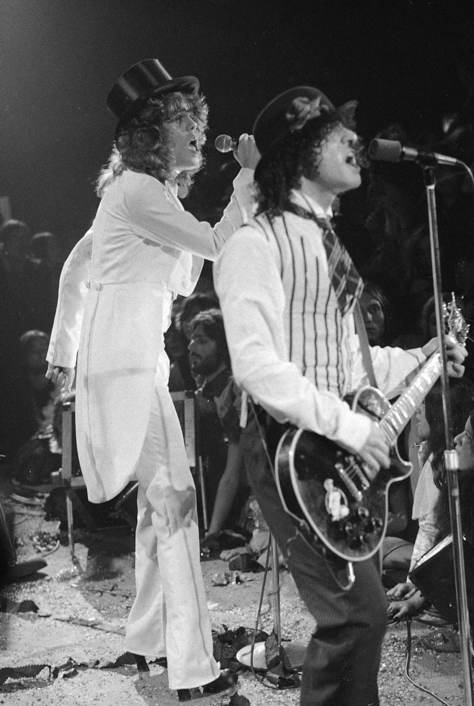 The New York Dolls perform at the Waldorf Halloween Ball in NYC, 1973.