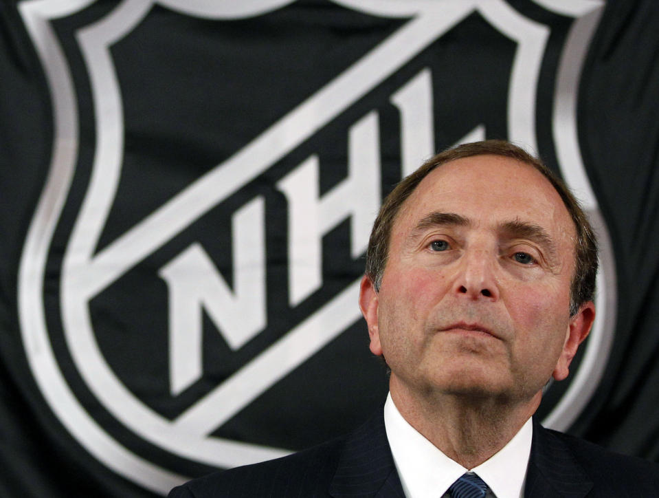 FILE - In this Sept. 13, 2012, file photo, NHL hockey commissioner Gary Bettman listens as he meets with reporters after a meeting with team owners, in New York. The NHL locked out its players at midnight Saturday, becoming the third major sports league to impose a work stoppage in the last 18 months. The action also marks the fourth shutdown for the NHL since 1992, including a year-long dispute that forced the cancellation of the entire 2004-05 season when the league held out for a salary cap. The deal which ended that dispute expired at midnight, and Commissioner Gary Bettman followed through on his longstanding pledge to lock out the players with no new agreement in place. (AP Photo/Mary Altaffer, File)