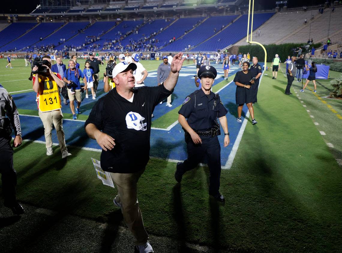 Duke head coach Mike Elko acknowledges the crowd following the Blue Devils 30-0 victory over Temple at Wallace Wade Stadium on Friday, Sept. 2, 2022, in Durham, N.C.