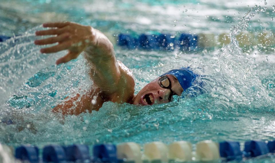 Ian Malone of  Washington High School swims the 200 yard Freestyle during the Patriot Invitational swim meet at the University of West Florida Aquatic Center Saturday, September 17, 2022