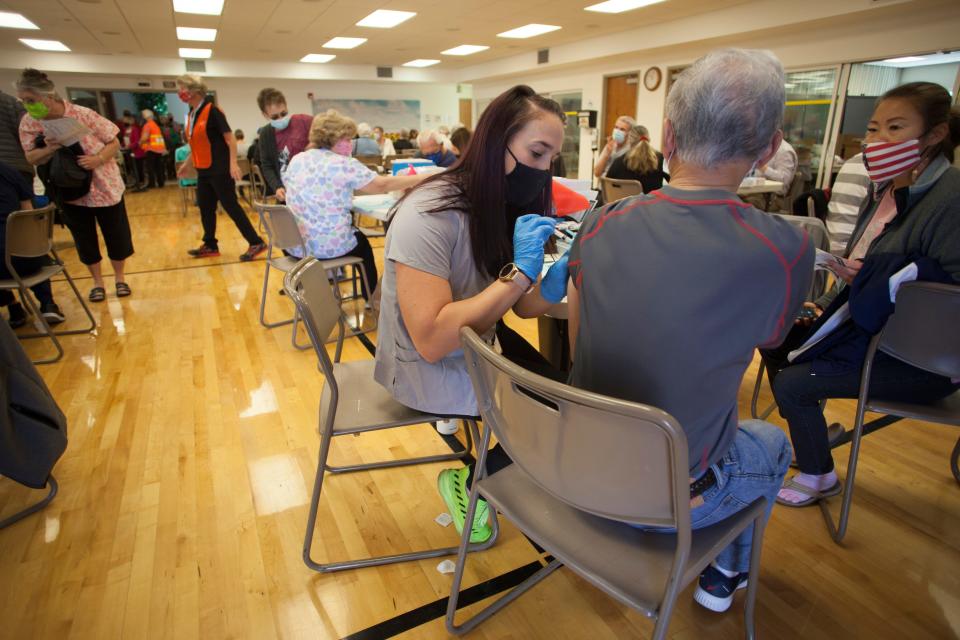 Medical workers from the Southwest Utah Public Health Department administer more than 3000 COVID-19 vaccinations to Washington County residents at the St. George Active Life Center Thursday, Feb. 11, 2021.