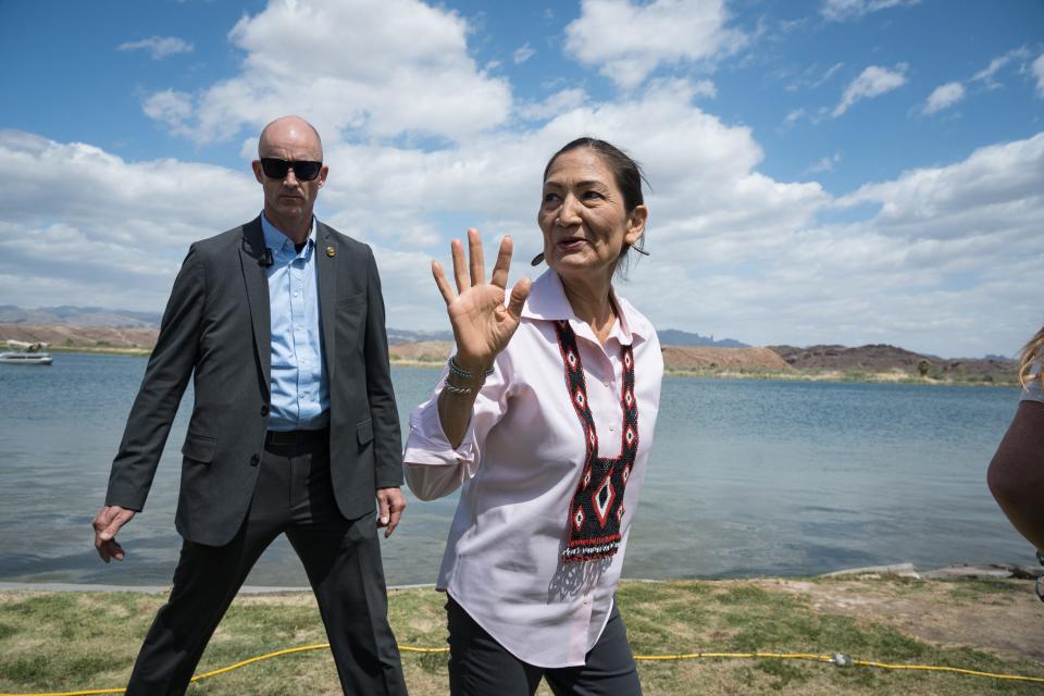 United States Interior Secretary Deb Haaland leaves after signing the Colorado River Indian Tribes water rights settlement, closely followed by security at the BlueWater Resort on April 26, 2024, in Parker, Ariz.