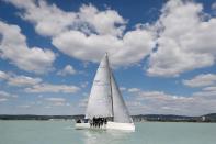 Members of a sailing race team practice on Lake Balaton, following the outbreak of the coronavirus disease (COVID-19), near Balatonfured