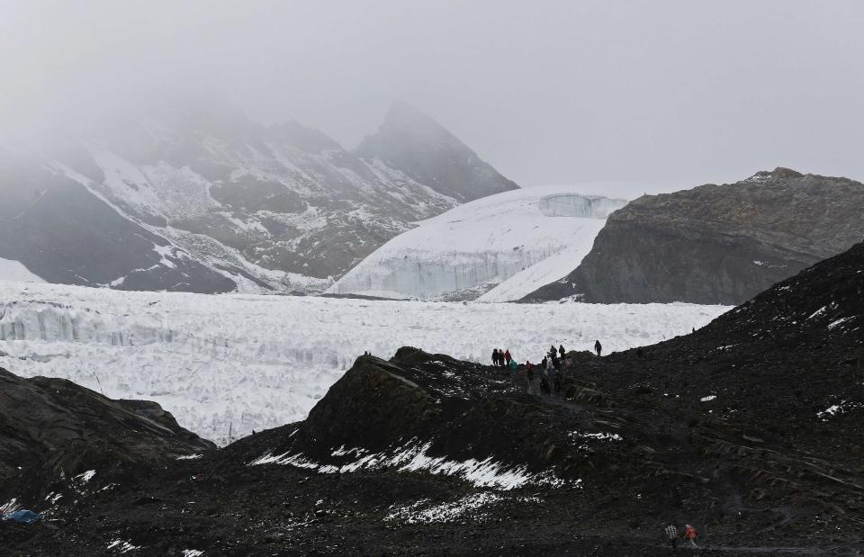 Tourists visit the Pastoruri glacier along the Climate Change Route in Huaraz