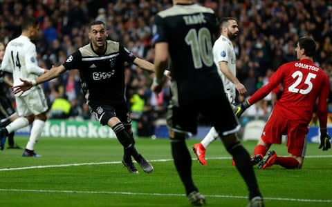 Ajax celebrate victory over Real Madrid - Credit: AP