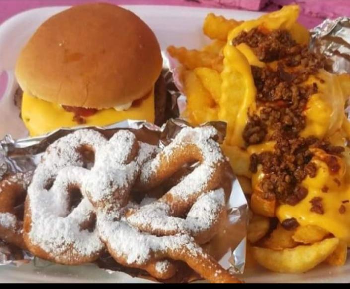 Burgers, chili cheese fries and, of course, funnel cakes are on the menu at Queenz Carnival Stop in Montgomery.