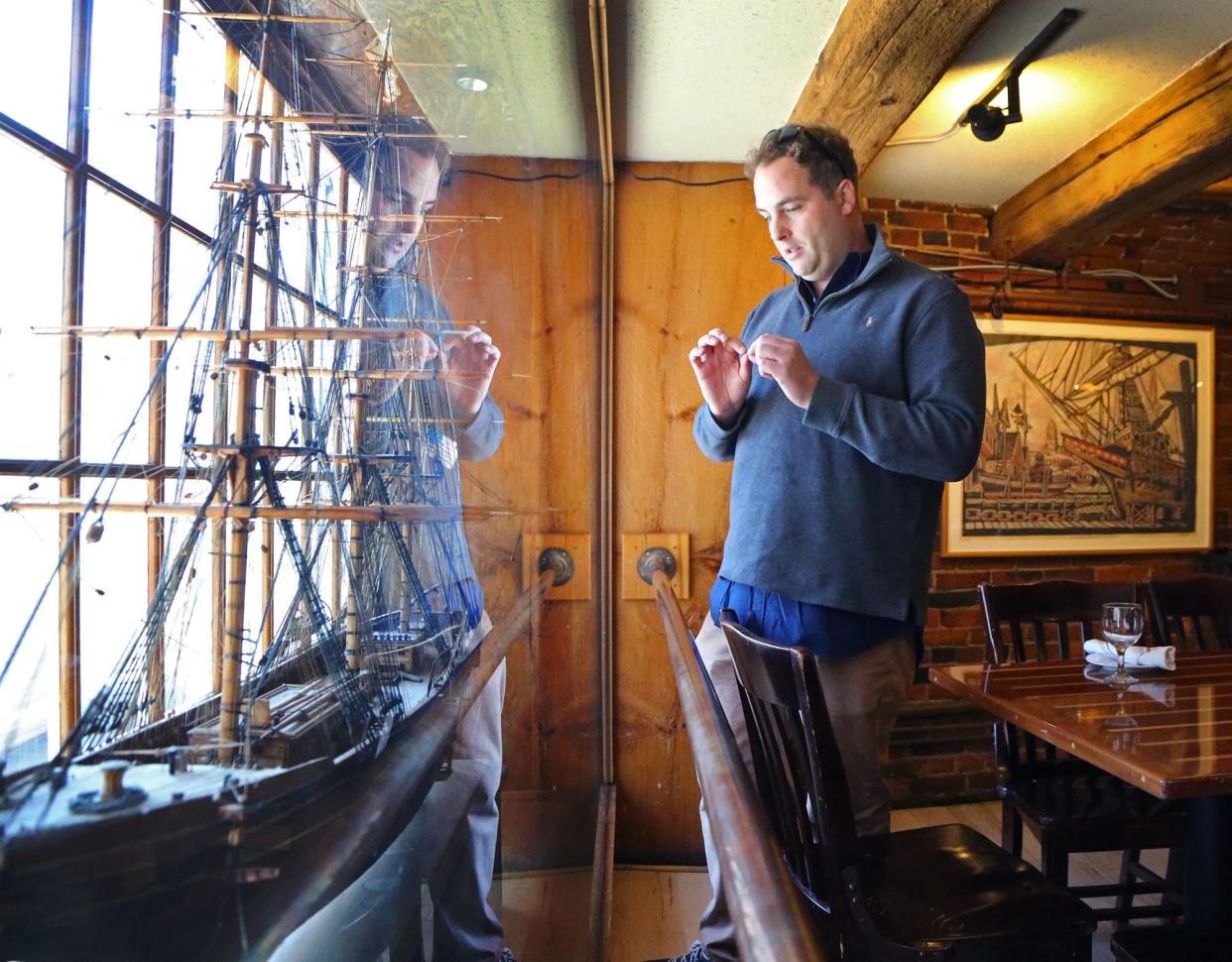 Oar House restaurant owner Casey Anderson talks about the model of a Portsmouth-built vessel The Witch of the Wave and the rich history of ship building locally.