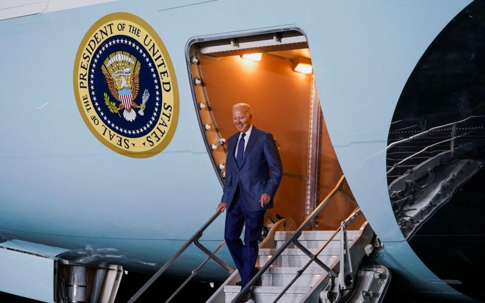 Joe Biden, the US President, disembarks Air Force One after his arrival at RAF Aldergrove airbase in County Antrim, Northern Ireland, last night - Kevin Lamarque /Reuters 