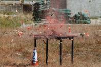 High explosives detonate inside watermelon at EOD depot of Hong Kong police during media tour in Hong Kong