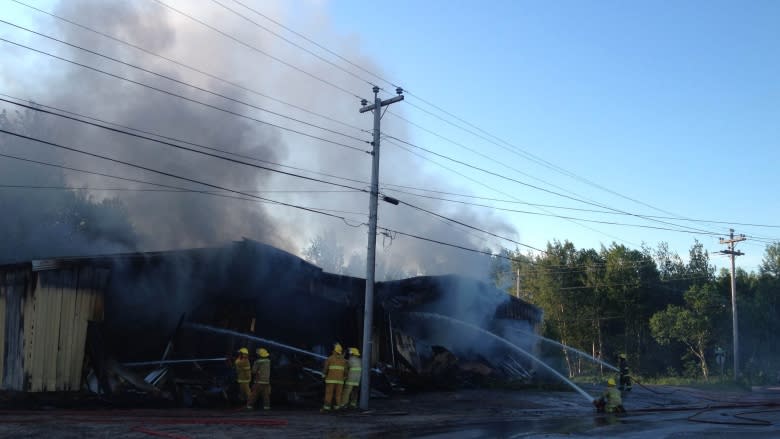 Firefighters battle blaze at furniture warehouse in Labrador