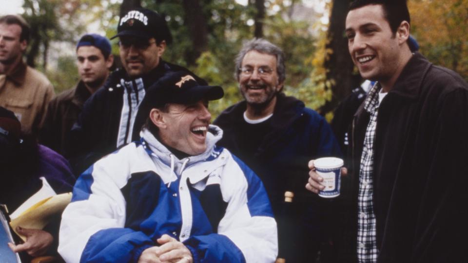 Dennis Dugan, Sid Ganis and Adam Sandler on the 'Big Daddy' set