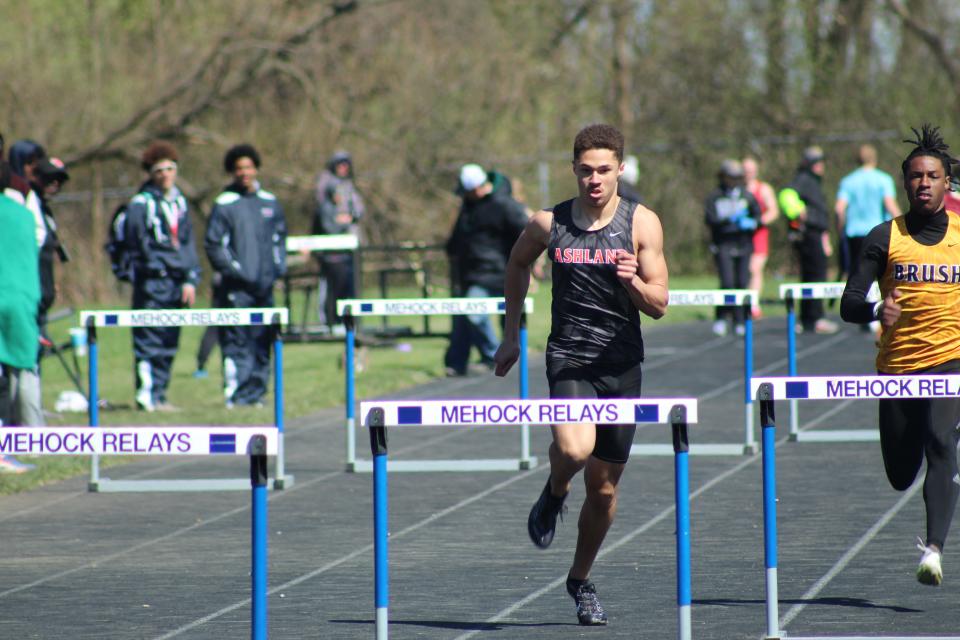 Goings runs in the 300 hurdles at this year's Mehock Relays.