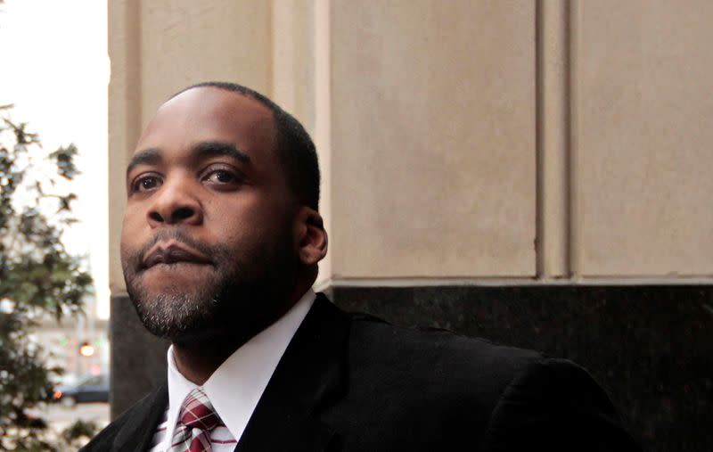 FILE PHOTO: Former Detroit Mayor Kwame Kilpatrick leaves the U.S. District Court after he was convicted on federal racketeering and other charges in Detroit