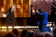 <p>In March 2019, Nicks <a href="https://people.com/music/stevie-nicks-sings-duet-harry-styles-mistaking-him-for-nsync/" rel="nofollow noopener" target="_blank" data-ylk="slk:became the first woman to be inducted into the Rock & Roll Hall of Fame twice;elm:context_link;itc:0;sec:content-canvas" class="link ">became the first woman to be inducted into the Rock & Roll Hall of Fame twice</a>, this time earning the accolade for herself as a solo artist. She was awarded the honor by none other than Harry Styles, who also joined the singer on stage for a duet of "Stop Draggin' My Heart Around." </p>