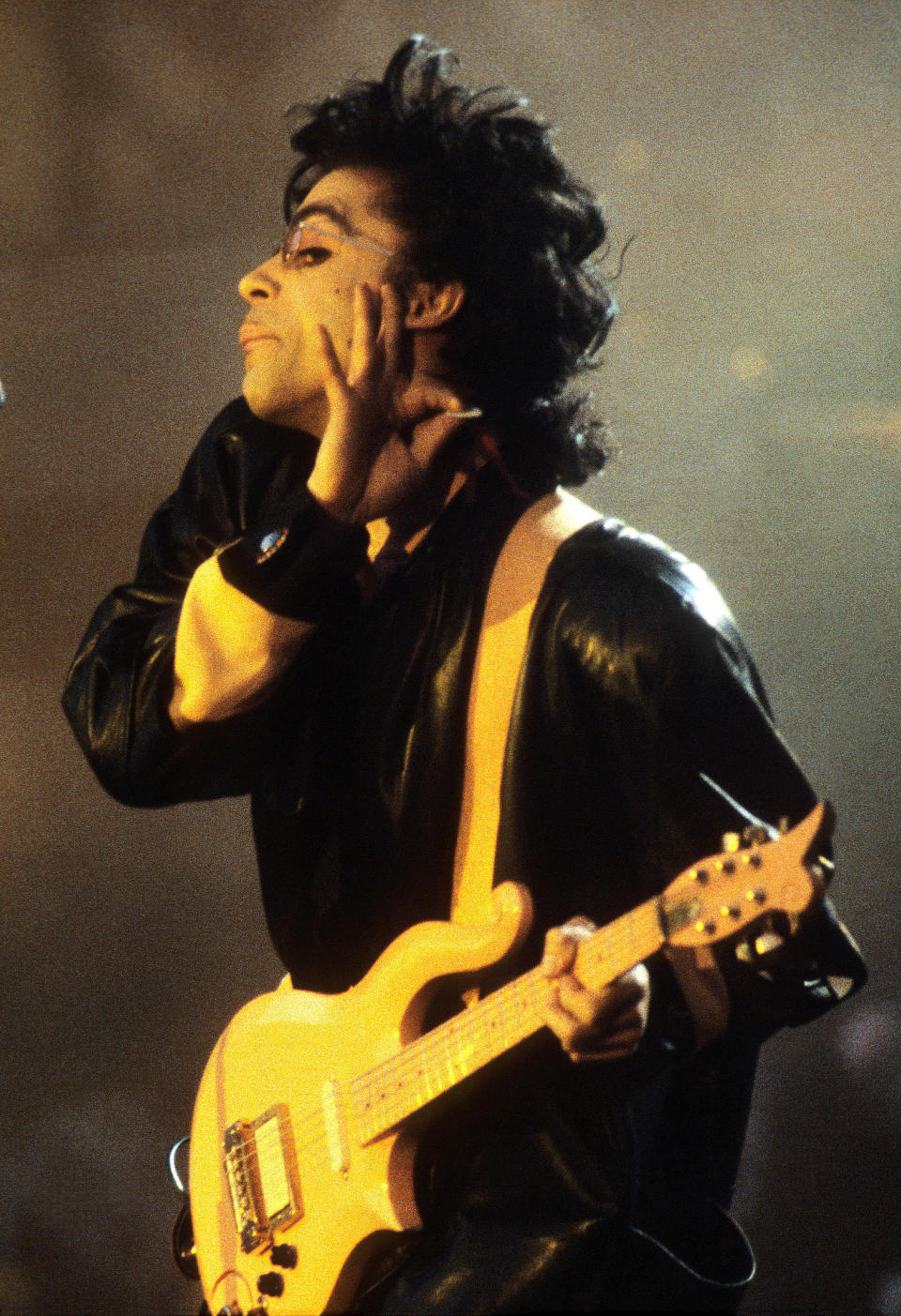 Prince performs during his Sign "O" the Times tour in 1987. (Photo: Rob Verhorst via Getty Images)