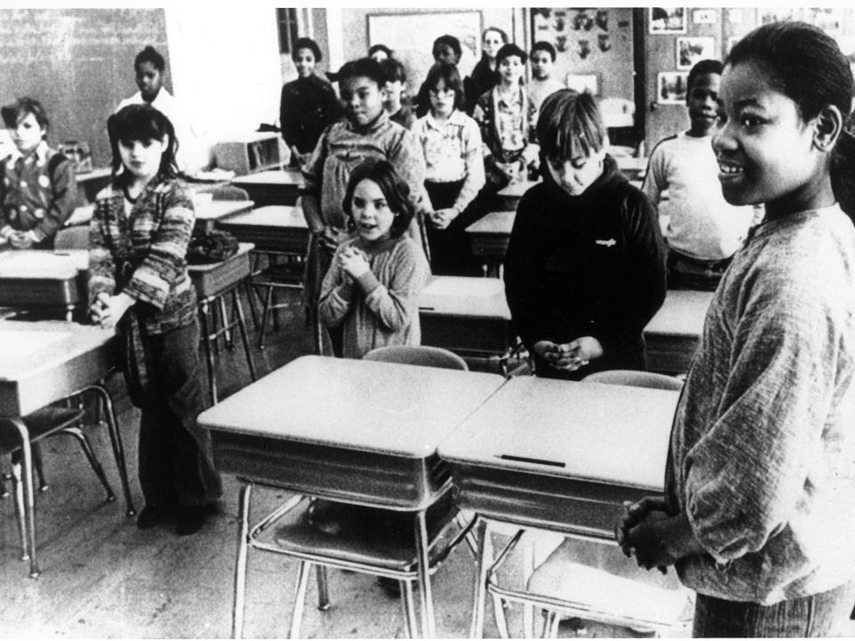 Students pray in school in 1980