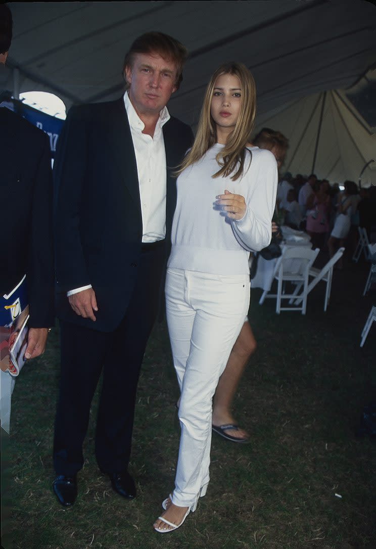Donald Trump and Ivanka Trump pose under a tent. (Photo by Rose Hartman/Getty Images)